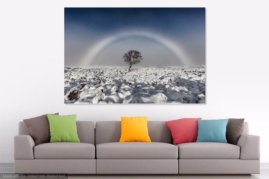 Print of Fogbow hanging on the wall above a sofa